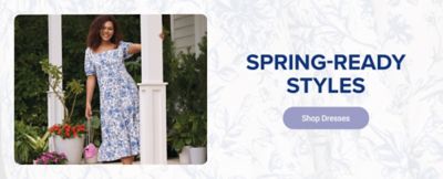 An image of a woman wearing a floral dress. Spring ready styles. 