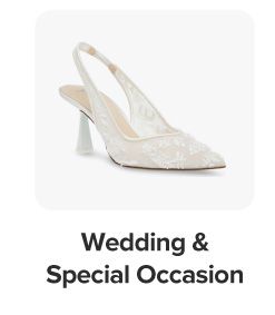 A white high heeled shoe. Shop wedding and special occasion.