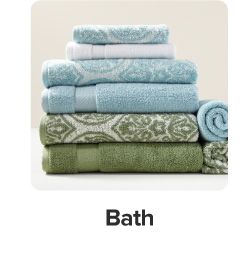 An image of a stack of folded towels. Bath.