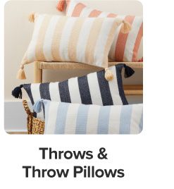 An image of striped throw pillows. Throws and throw pillows. 