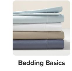 An image of folded sheets. Bedding basics. 