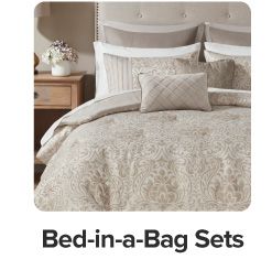 An image of a bed. Bed in a bag sets.