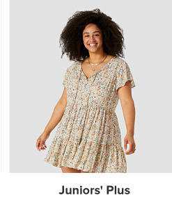 A woman in a tiered dress. Juniors' plus. 