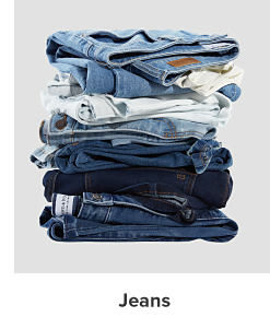 A stack of folded jeans. Jeans. 