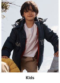 A boy in a Nautica coat. Shop kids
