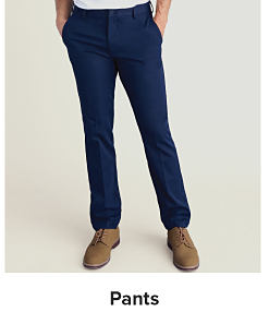 Image of navy blue dress pants. Shop pants.