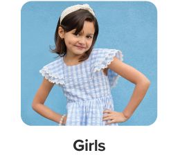 A girl wearing a gingham dress. Girls.