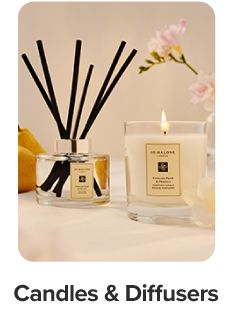 Shop candles and diffusers. A candle and diffuser.