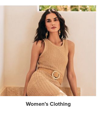 An image of a woman wearing a dress. Women's clothing. 