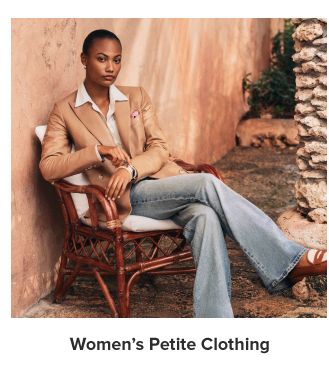 An image of a woman wearing a blazer and jeans. Women's petite clothing. 