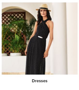 An image of a woman wearing a dress. Dresses. 