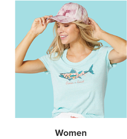 Woman wearing a shirt with shark graphic on it. 