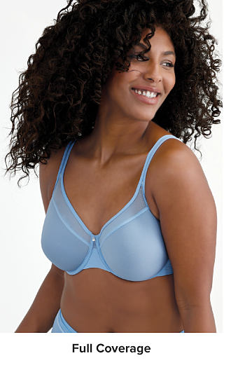 An image of a woman wearing a blue bra. Shop full coverage.