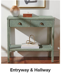 Image of a green console table. Entryway and hallway.