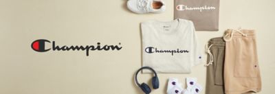 Champion sweatshirts, shorts and socks beside a pair of headphones. Champion.