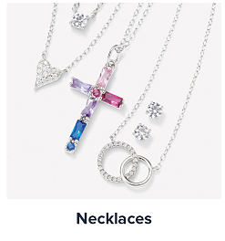 Diamond necklaces, including cross and heart designs. Shop necklaces.