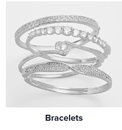 Four diamond bracelets in different styles. Shop bracelets.
