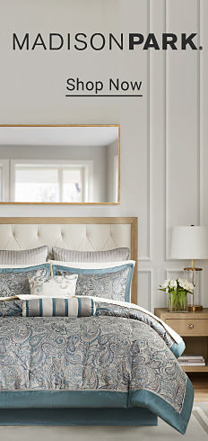 Image of a bed with blue bedding. Madison Park. Shop now.