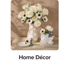 Vases filled with flowers. Shop home decor.