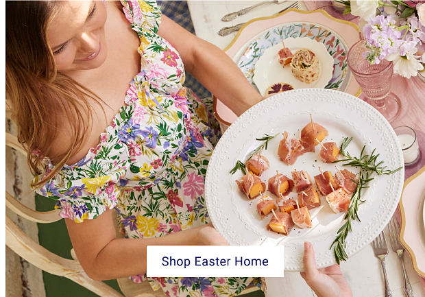 Image of brunch table with floral and pastel dinnerware. Shop Easter Home. 
