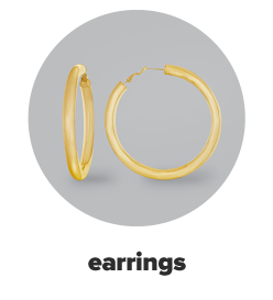 Two gold hoop earrings. Earrings.