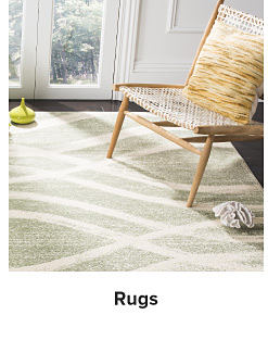 A white and green rug. Shop rugs.