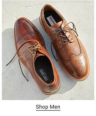 A pair of brown leather men's dress shoes. Shop men.