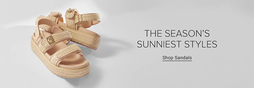 A pair of woven platform sandals. The season's sunniest styles. Shop sandals.