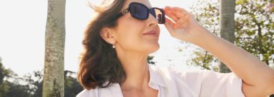 An image of a woman wearing sunglasses.