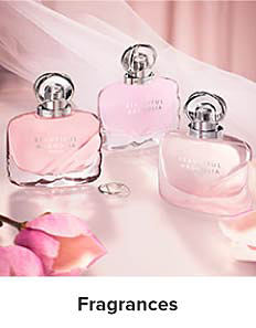An image featuring three bottles of fragrances. Shop fragrances.