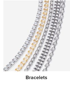Image of various gold bracelets. Shop bracelets.