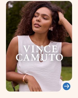 Image of a woman wearing a white tank top. Vince Camuto logo.