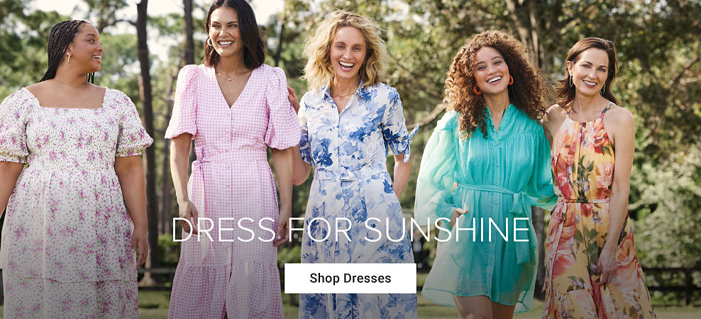 An image featuring a group of women wearing spring dresses. Dress for sunshine. Shop dresses.