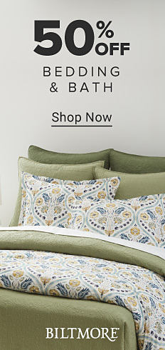 50% off bedding and bath. Shop now. Biltmore. Image of a bed with light green bedding.
