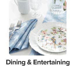 An image of plates, napkins and drinkware. Dining and entertaining. 