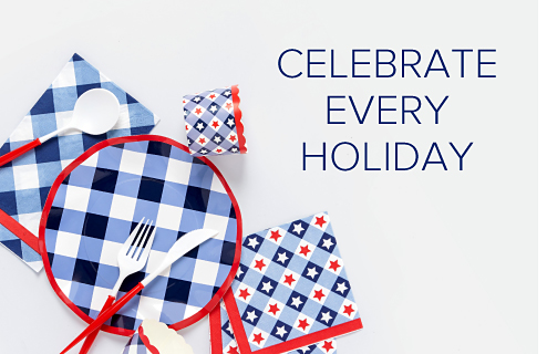 Celebrate every holiday. Assortment of red, white and blue plates, cutlery and napkins.
