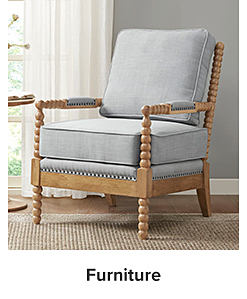 A wooden chair with gray cushions. Shop furniture. 