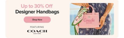Image of a woman holding a small Coach handbag with a scarf. Up to 30% off designer handbags. Shop now. Featuring the Coach logo.