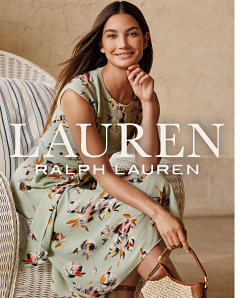 A woman wearing a green floral sleeveless dress. Lauren Ralph Lauren.