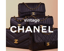 Black quilted Chanel handbags in various styles, all with gold chain straps and gold logos. Vintage Chanel. 