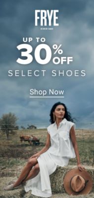 Image of a woman in casual shoes, white skirt and white shirt sitting on a hay bale. Frye logo. Up to 30% off select shoes. Shop now.