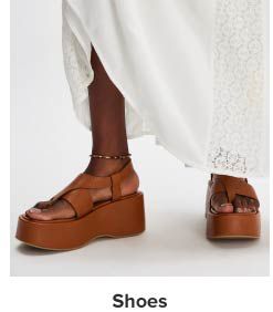 Brown sandals. Shop shoes.