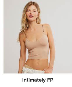 A woman in a tank top. Shop intimately FP.
