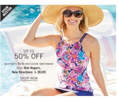 A woman in a colorful bathing suit, wide-brimmed hat and sunglasses sitting by a pool. Door buster. Up to 50% off women's belk exclusive swimwear from kim rogers, new directions and Zelos. Shop now.