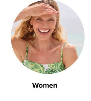 An image of a woman wearing a palm print outfit. Women.