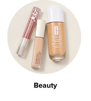 An image of three beauty products. Beauty.
