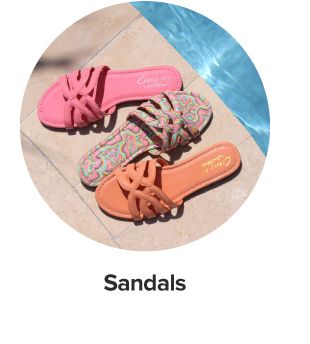 An image of three sandals, shop sandals. 
