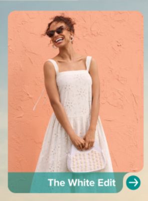A woman in a white dress. The White Edit.