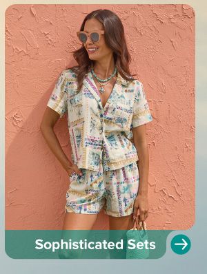 A woman in a matching shirt and short set. Sophisticated Sets.