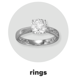 A single diamond ring with a silver band. Rings. 